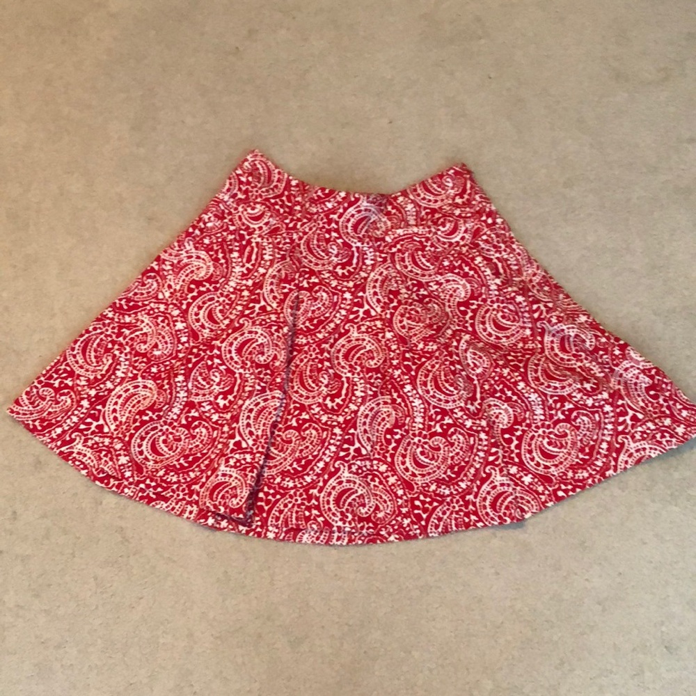 Red and white pleated skirt